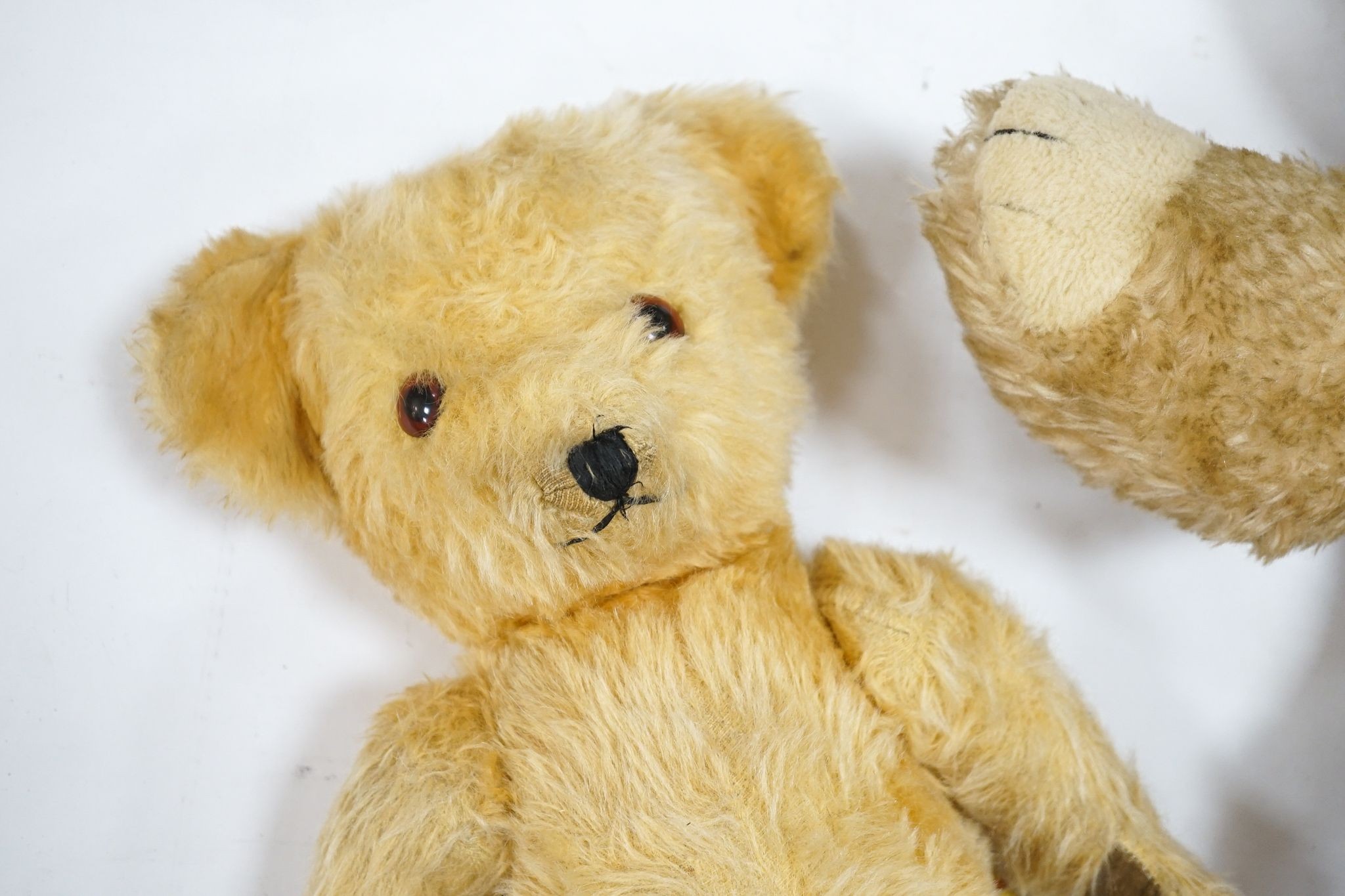 Wendy Boston, 24in. with label, good condition, together with a Deans with label, 18in., good condition and an unjointed 1950's English bear, 19in.